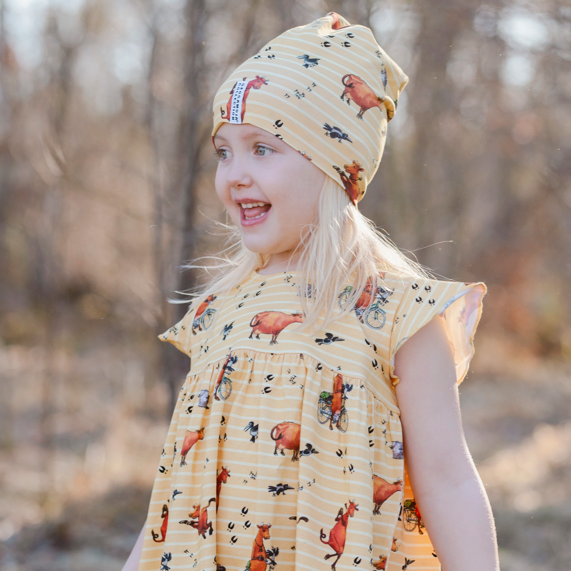 Mössa Mamma Mu och Kråkan Gul/Vit